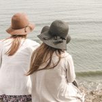 beach, hats, nature, women, pair, couple, fashion, style, stylish, backs, young women, shore, seashore, friendship, girl friends, ocean, outdoors, people, sand, sea, water, friends